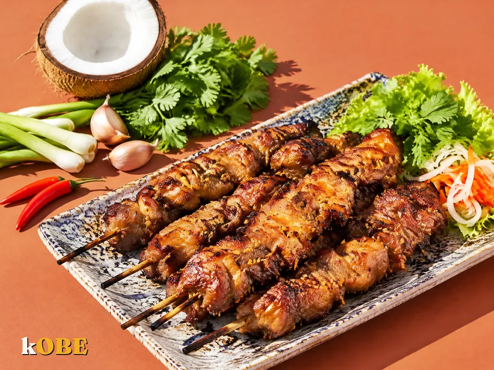 Thịt xiên nướng nước cốt dừa (kẹp bánh mì), nấu bằng đường la hán quả